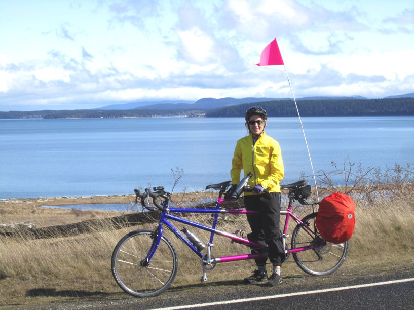 Rich's riding partner is all smiles on their tandem